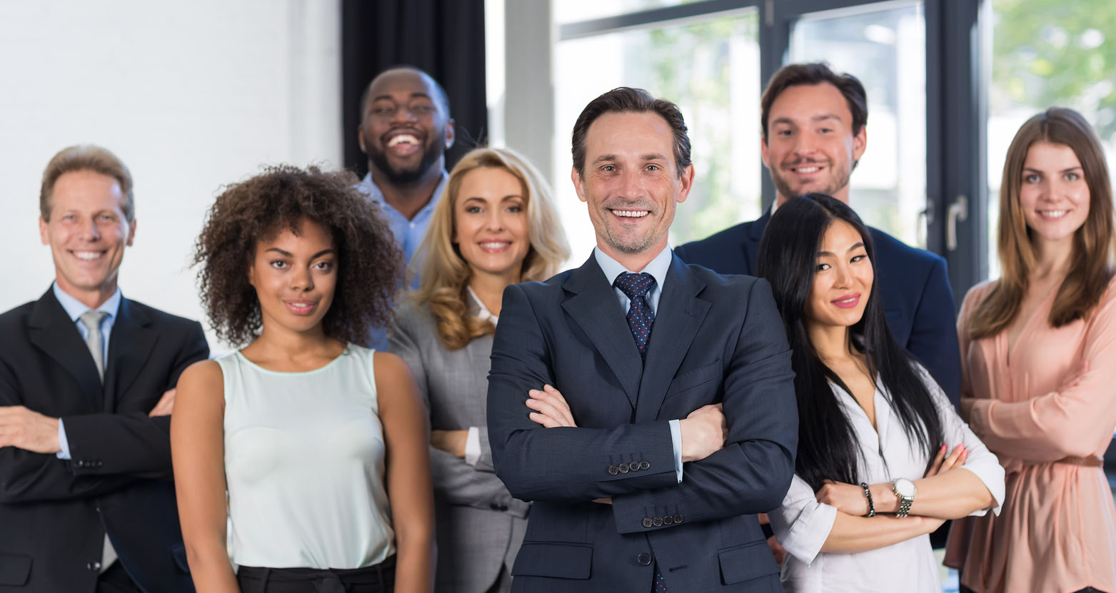 A group of people standing next to each other.